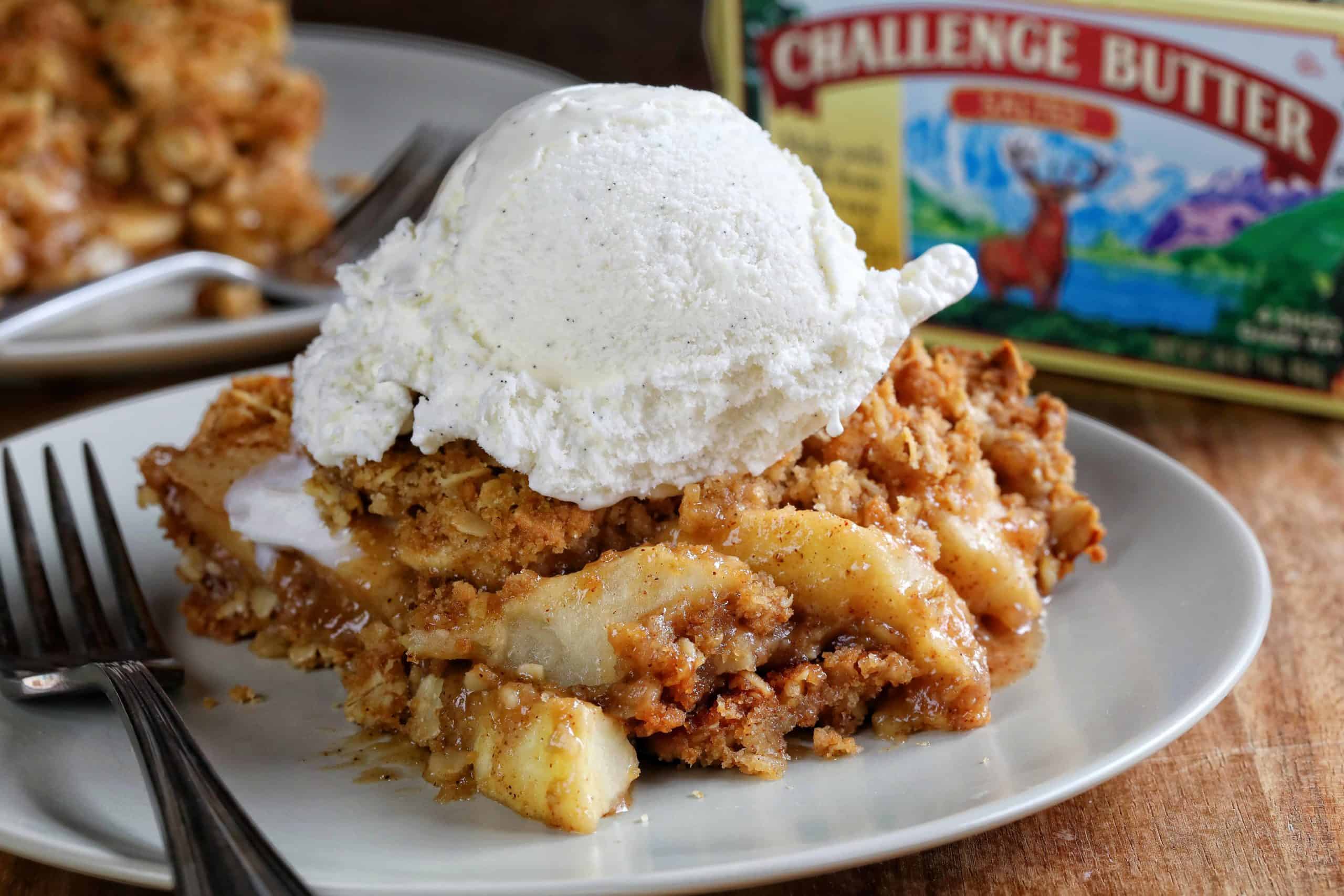 This is the only Apple Crisp recipe you will ever need!! HUGE flavor! Apple Crisp, Apple Crumble, perfect apple crisp, how to make apple crisp, easy apple crisp, i am baker, best apple crisp, easy apple crisp, award wining apple crisp, i am baker, iambaker, apple crumble recipe Apple Crisp on a Gray Plate with Fork