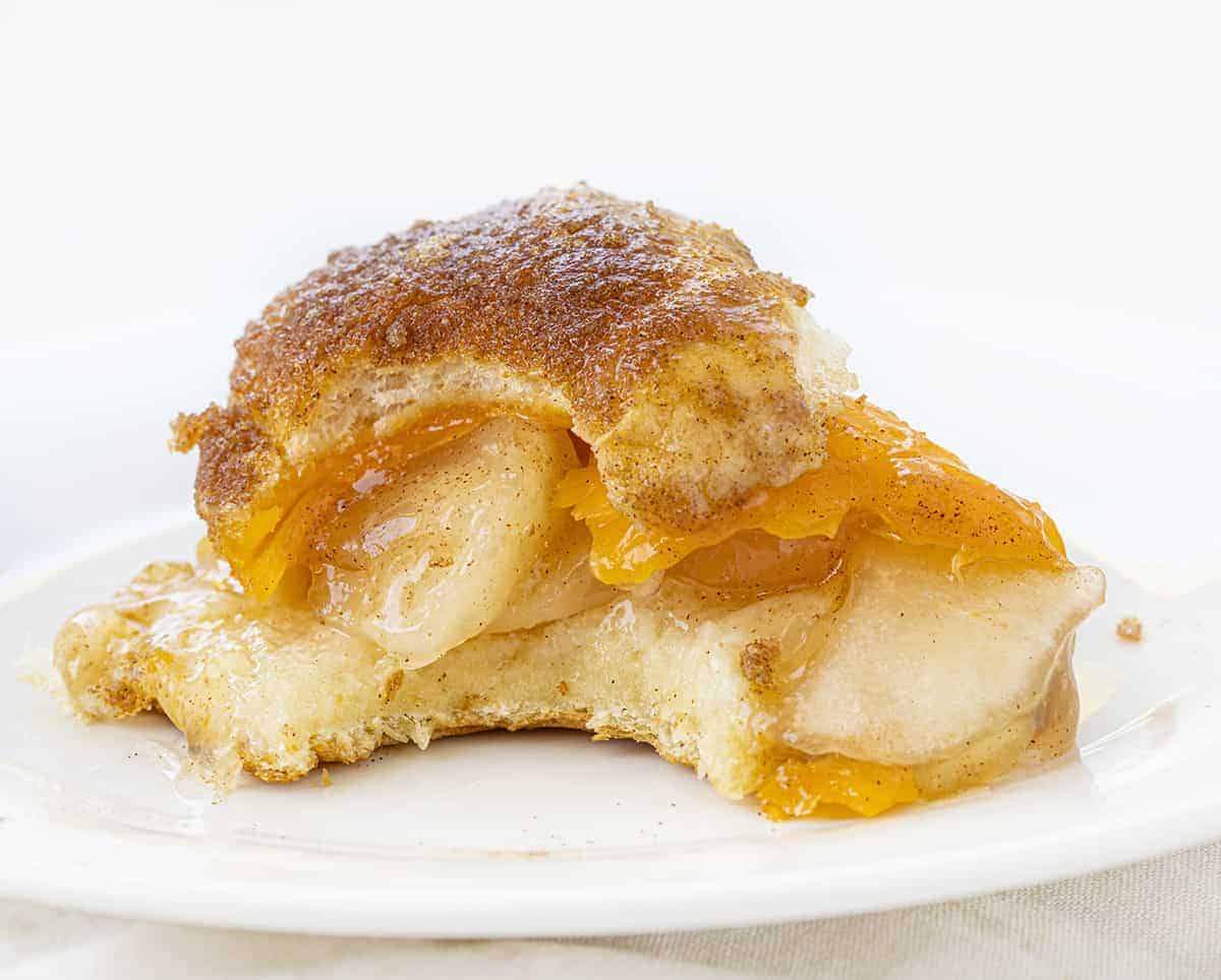 Sweet and scrumptious as apple pie with just the smallest hint of something different. The cheddar seems to lose its potent flavor and perfectly compliment the apple and cinnamon! Apple Pie Cheddar Sliders, Apple Pie Sliders, Dessert Sliders, Apple Cheese Sliders, Sliders Recipe, Recipes, iambaker, i am baker Bite Taken Out of Apple Cheddar Slider