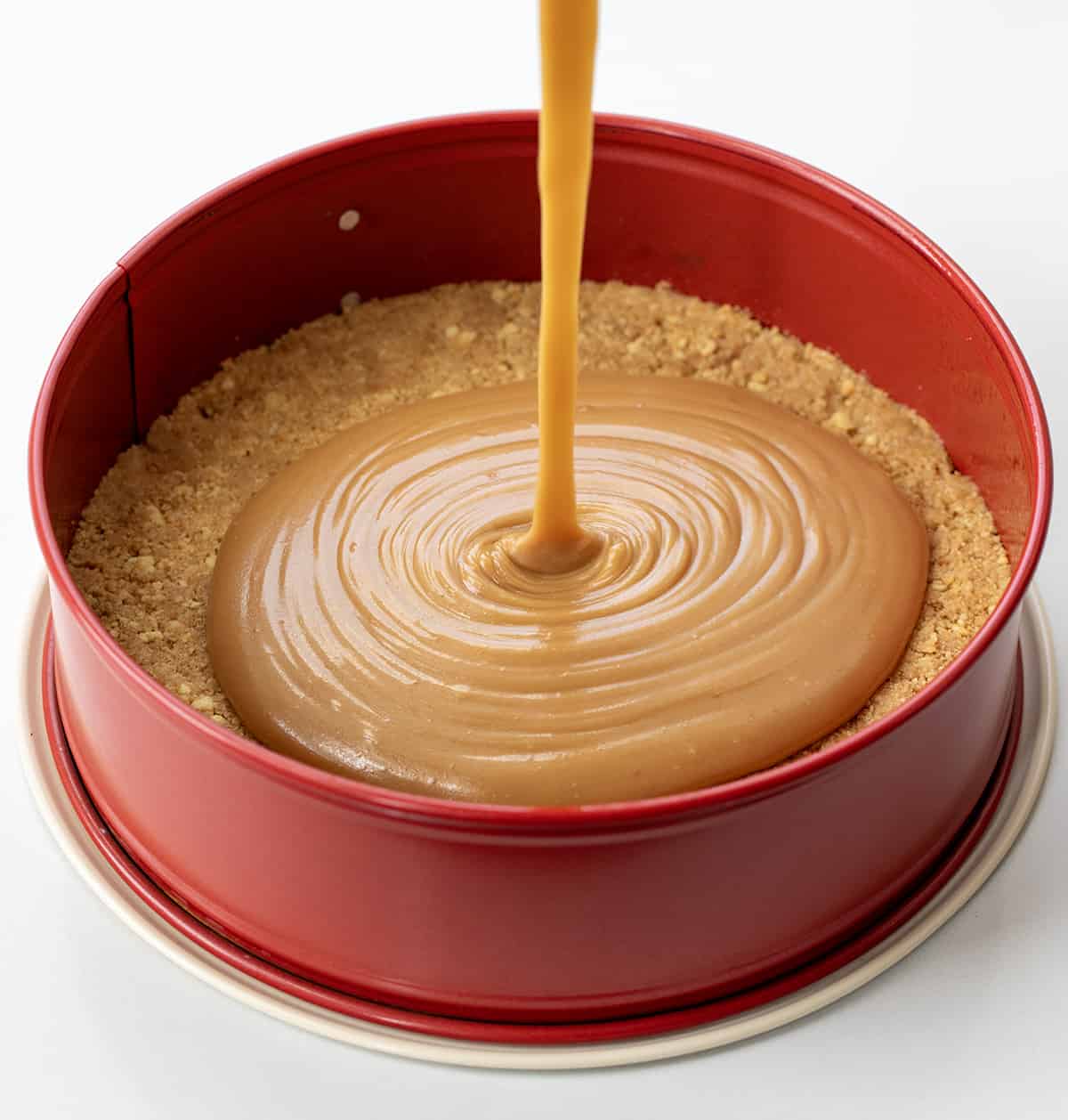 Pouring Caramel into Springform Pan.