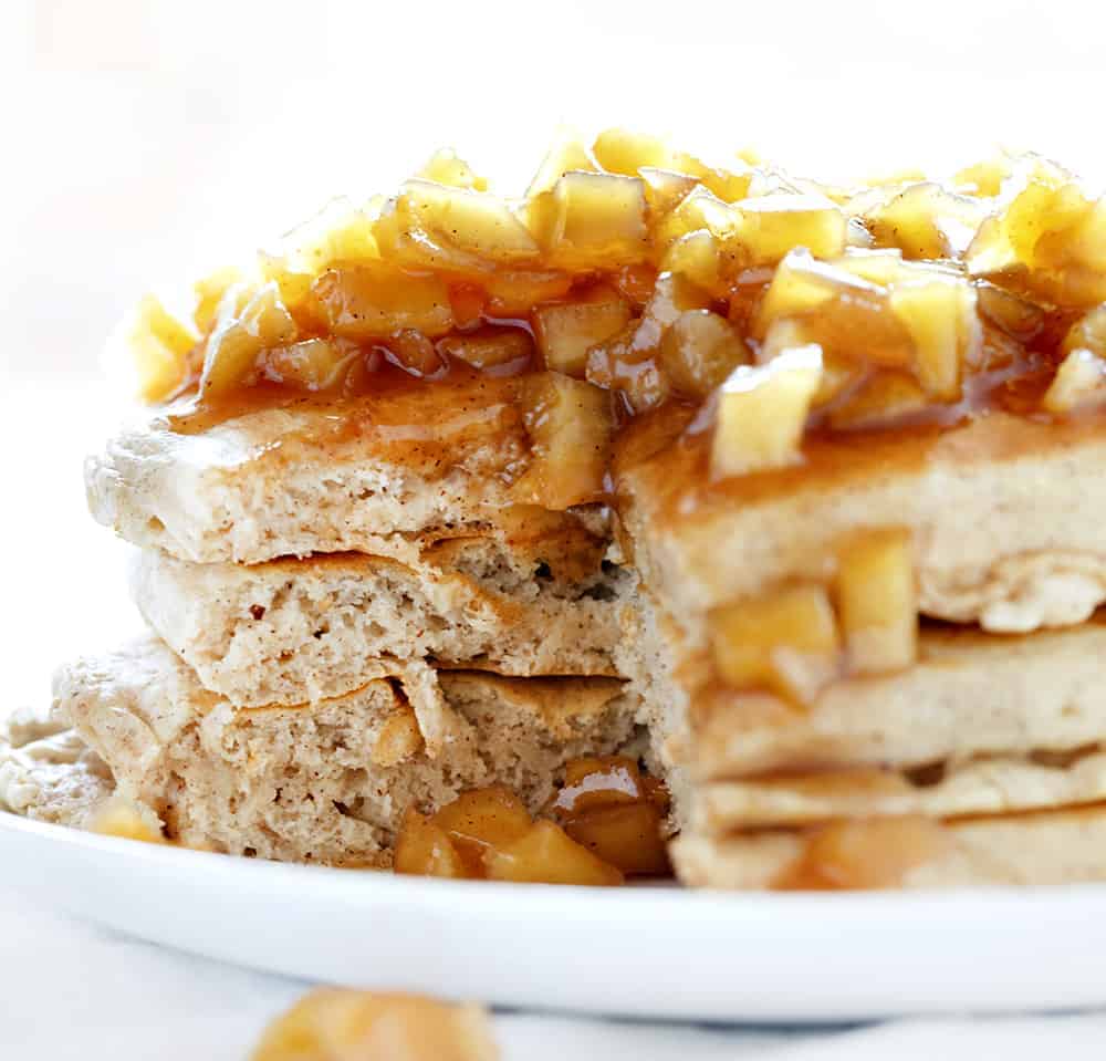 Light and fluffy apple pancakes topped with an apple topping make these Spiced Apple Pancakes too good to pass up! spiced apple pancakes, homemade apple pie spice, apple pie spice, apple spice, iambaker, comfort food, hot breakfast, pancakes, johnnycakes, hotcakes, breakfast, weekend breakfast Cut into Spiced Apple Pancakes
