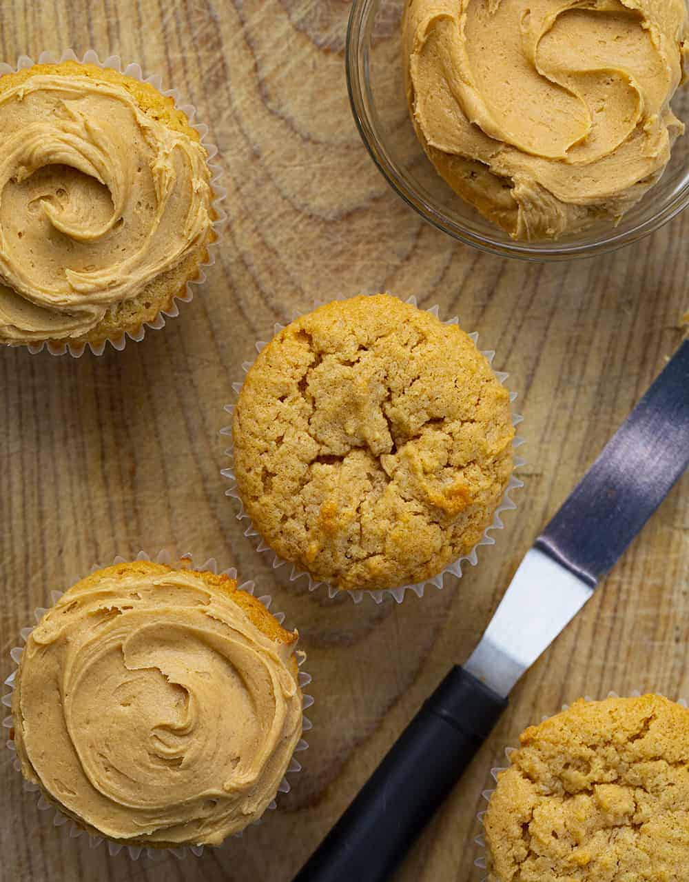 Peanut Butter Cupcakes with Peanut Butter Frosting are cupcakes made with peanut butter and topped with a homemade peanut butter frosting. Peanut Butter Cupcake, Peanut Butter Frosting, Moist Peanut Butter Cupcake, cupcake, cupcake recipes, baking, dessert, i am baker, iambaker Peanut Butter Cupcakes on Cutting Board