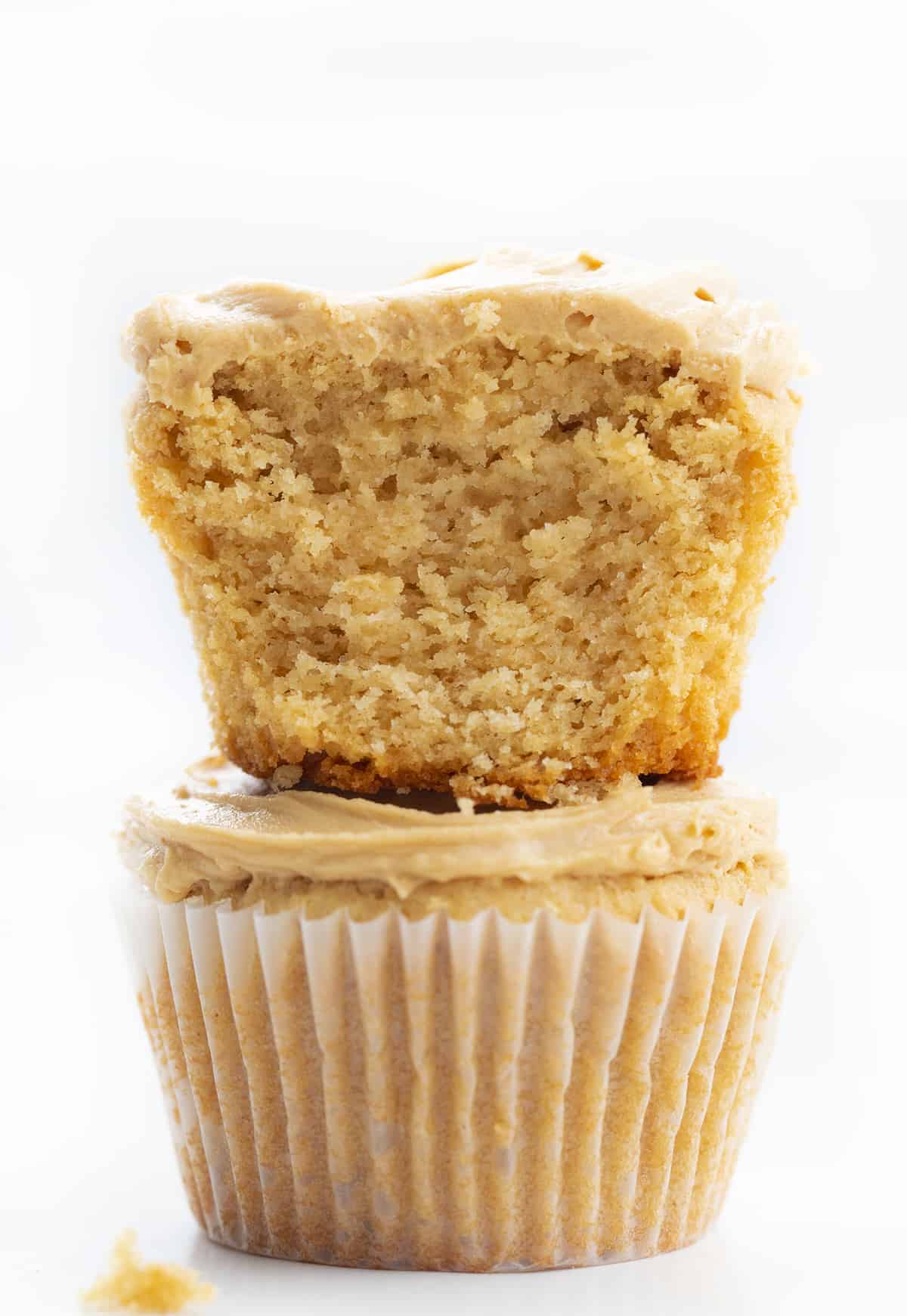 Peanut Butter Cupcakes with Peanut Butter Frosting are cupcakes made with peanut butter and topped with a homemade peanut butter frosting. Peanut Butter Cupcake, Peanut Butter Frosting, Moist Peanut Butter Cupcake, cupcake, cupcake recipes, baking, dessert, i am baker, iambaker Stacked Peanut Butter Cupcakes