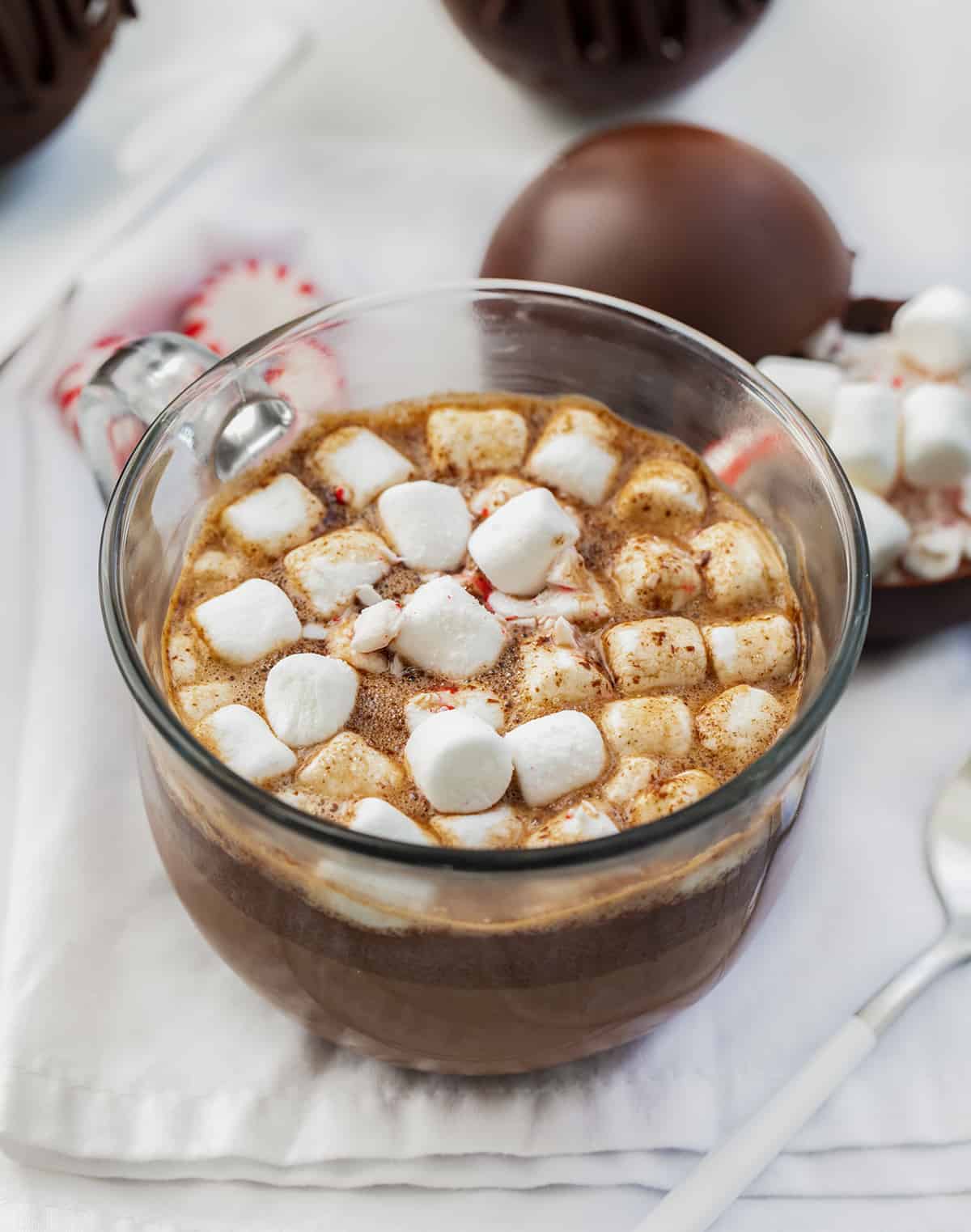 These Peppermint Hot Cocoa Bombs are not only amazingly delicious, but they are fantastic gift idea! With winter here, it’s time for hot drinks! It seems like peppermint also goes hand in hand with the coldest months of the year. When you add a bomb to a cup or mug of hot milk, it ‘explodes’, giving you a delicious cup of peppermint hot cocoa! Hot Cocoa Made from Peppermint Hot Cocoa Bombs.