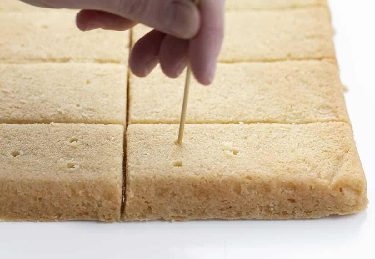 Shortbread Cookies are traditional Scottish biscuits with a buttery taste that have a soft and crumbly texture. The Best Shortbread Cookies, Authentic Shortbread Cookies, Shortbread Cookies, Shortbread Pie Crust, How to Make Shortbread, Cookies, Baking, i am baker, iambaker, recipes Adding Holes to Shortbread Cookies